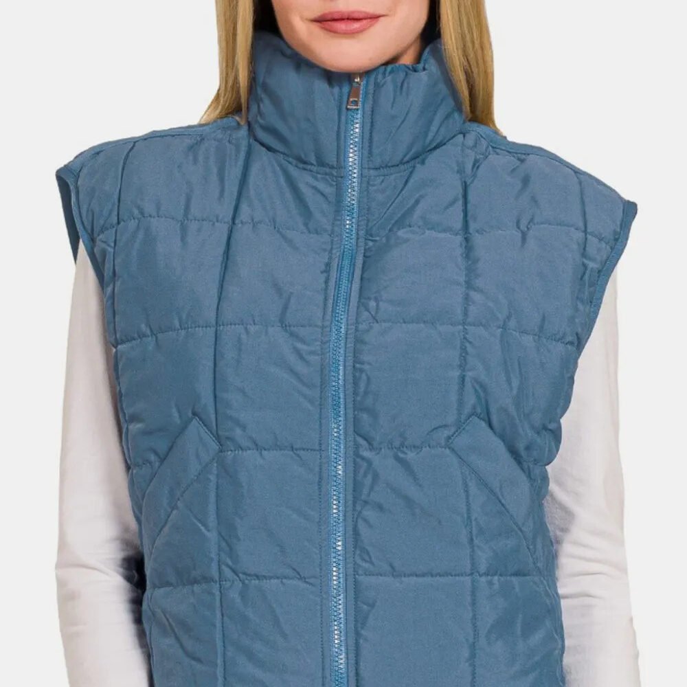 stylish Zip Up Cropped Puffer Vest, front view in blue puffer vest